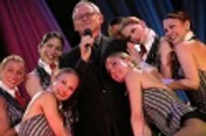 Victor Garber and the Rockettes Photo