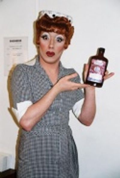Jason Zambos as "Lucy" Photo
