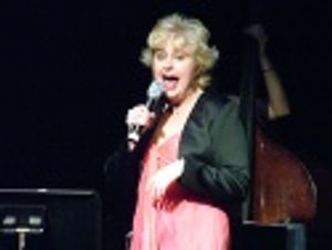 Sally Mayes camps it up for "The Money Song" Photo