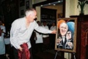 John Lithgow unveiling his painting  Photo