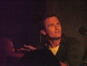 John tickles the mini-ivories... Photo