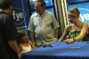 Christina signing for fans... Photo