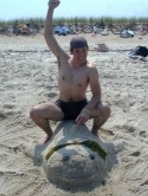 Johnny T rides his sand-whale Sally  Photo