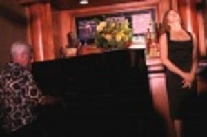 
Marvin Laird and Bernadette Peters  Photo