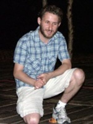 Michael answers questions from the kids in the program Photo