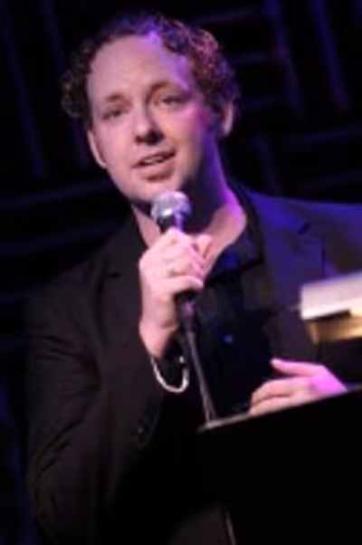 Host Jamie McGonnigal sings "Words He Doesn't Say" from Romance/Romance Photo