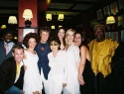 The Lennon Cast poses with Yoko Ono Lennon

  Photo