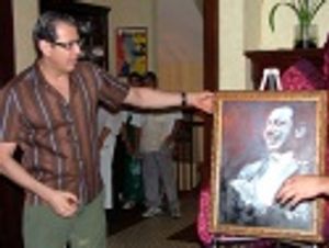 Jeff admires his portrait  Photo