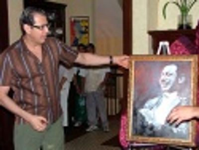 Jeff admires his portrait  Photo