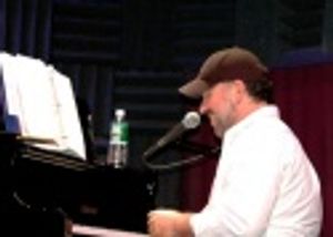 The man of the hour, Frank Wildhorn at the piano
 Photo