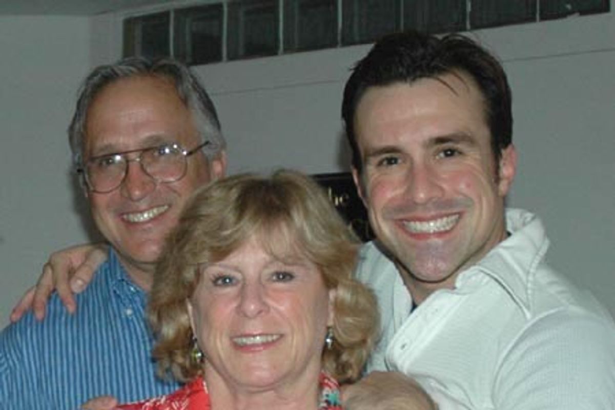 Josh Walden and his mother and father at 