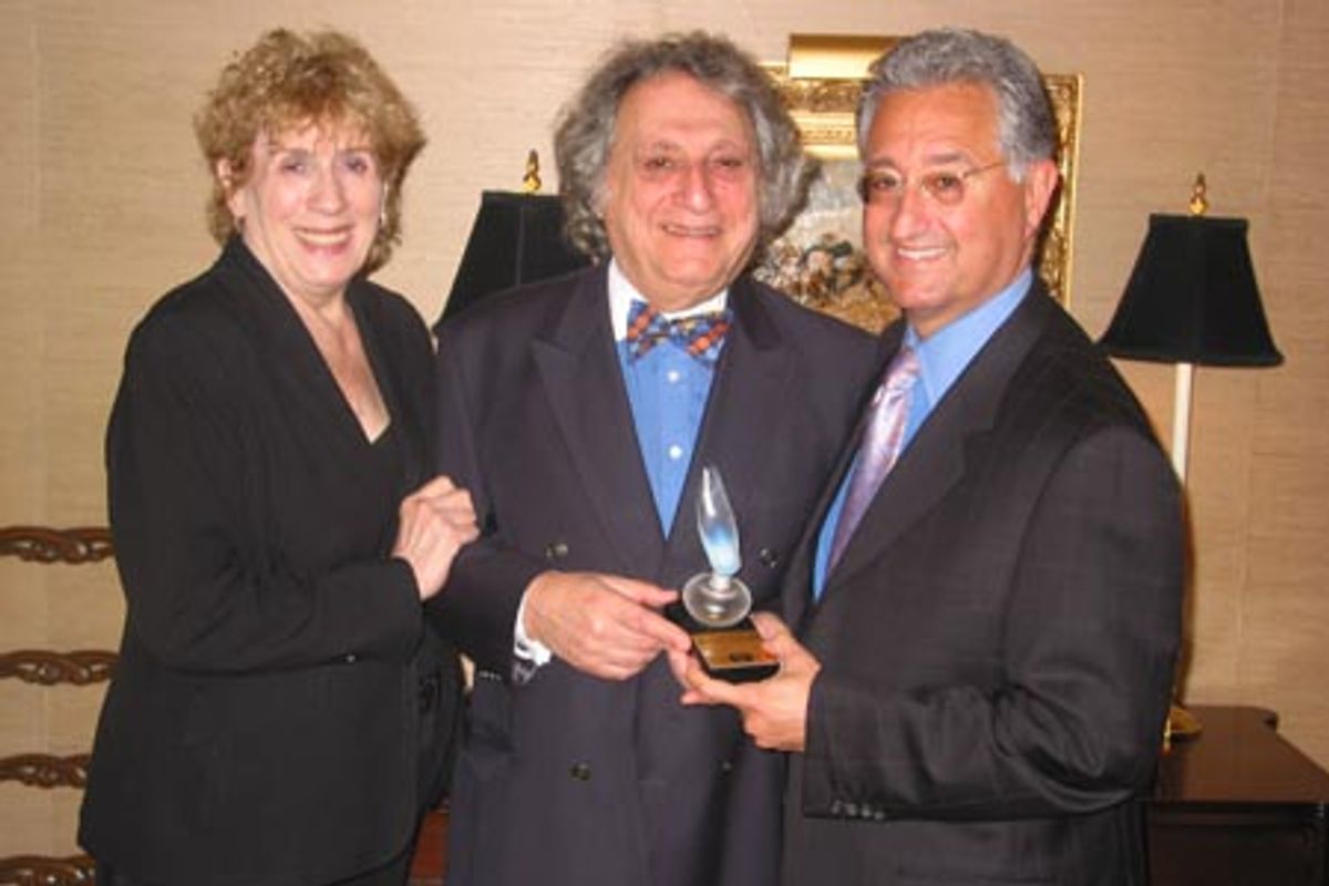 Drama Desk President William Wolf (center) presents the Workshop's special award to BMI's Jean Banks and Del Bryant at 