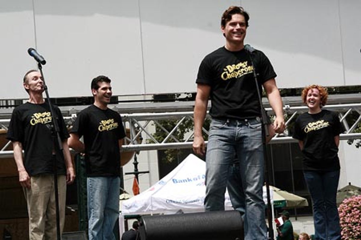 Troy Britton Johnson (forefront) and cast members of The Drowsy Chaperone
 at 