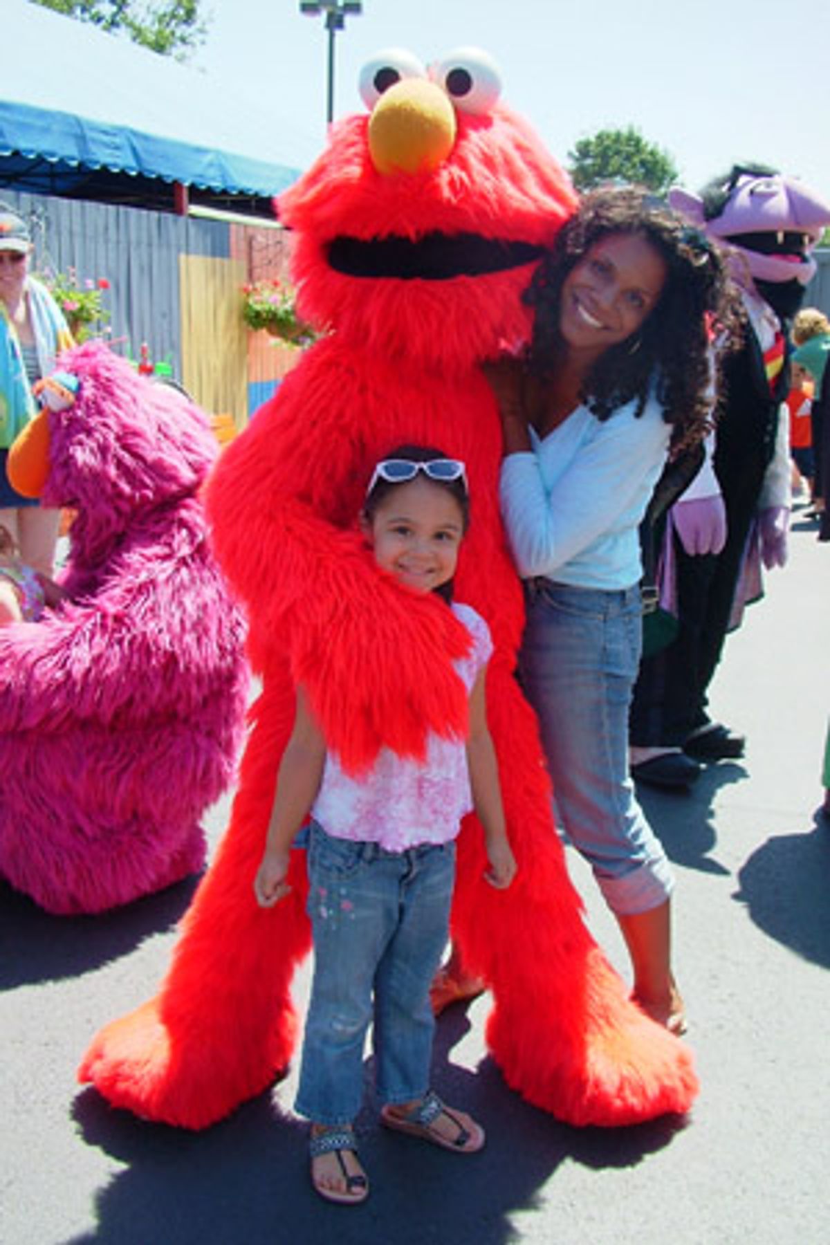 Audra McDonald, with Zoe and Elmo at 