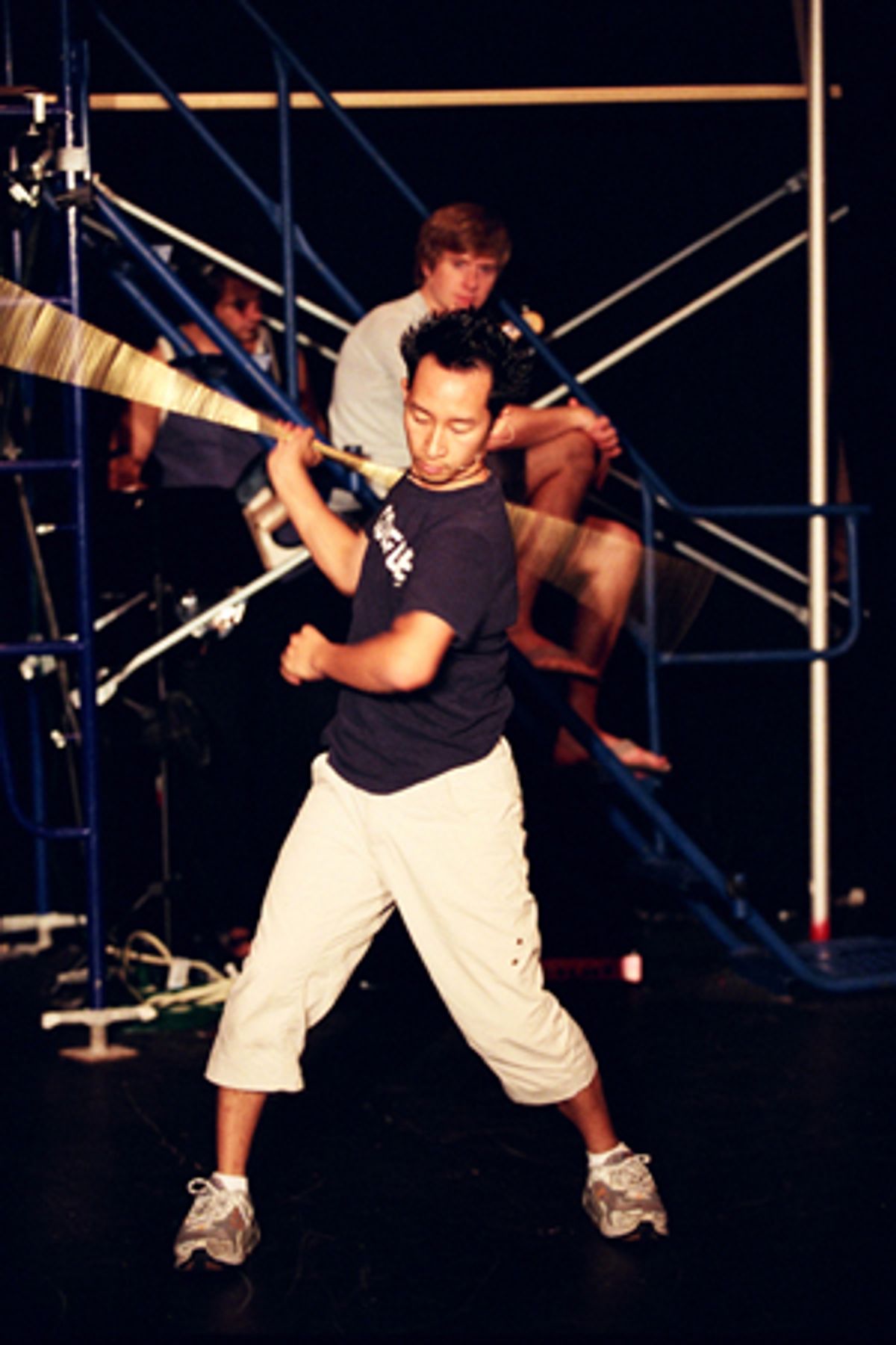 W. Wong rehearses for the martial arts battle sequences at 