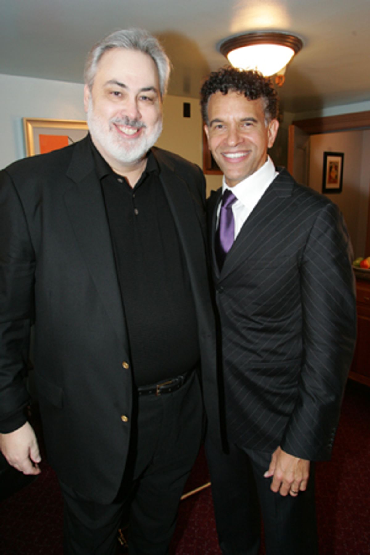 Evening sponsor Gene Dickey congratulates with Brian Stokes Mitchell after show in dressing room 
 at 