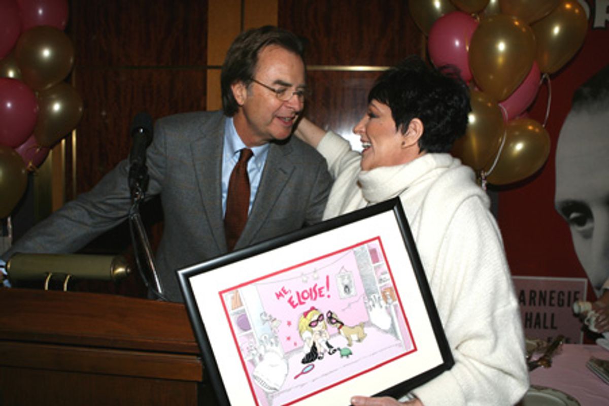 Robert Clasen, chairman and CEO of Starz, LLC, presents Liza Minnelli, the goddaughter of Kay Thompson, with a still from the series at 