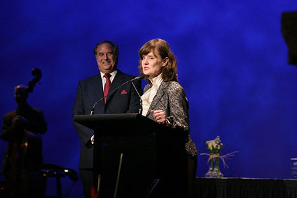 Stewart Lane (Chairman of the Board of Trustees) and Helen Guditis (President) at 