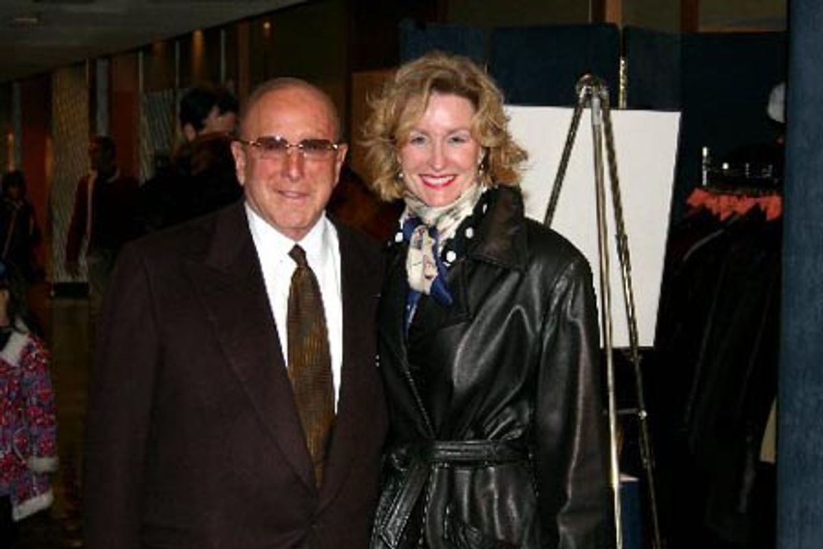 Clive Davis escorts Lisa Banes to the after-party at 