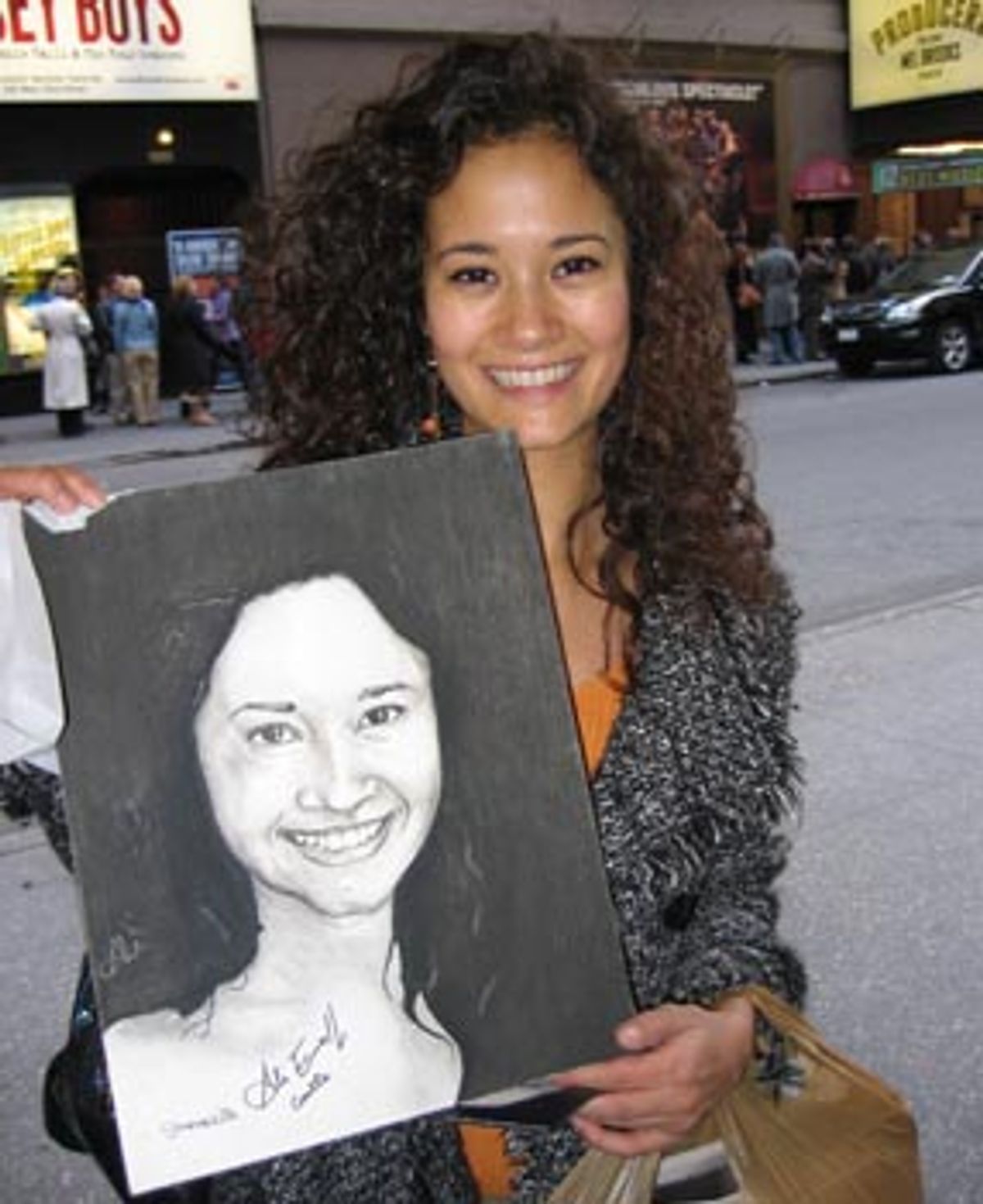 Ali Ewoldt with her portrait at 