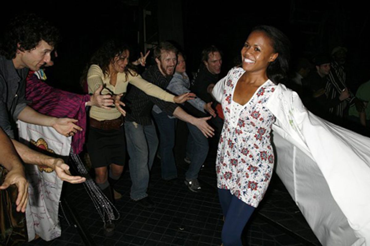 Nikki Renee Daniels in front of Daphne Rubin-Vega and other cast members at 