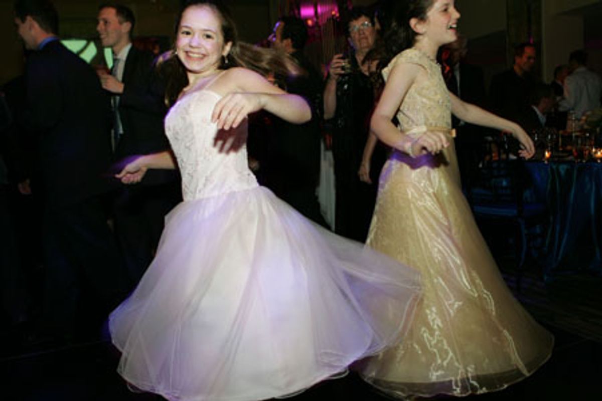  Katherine Leigh Doherty and Kathryn Faughnan, two of the Jane Banks, take a twirl around the dance floor at 