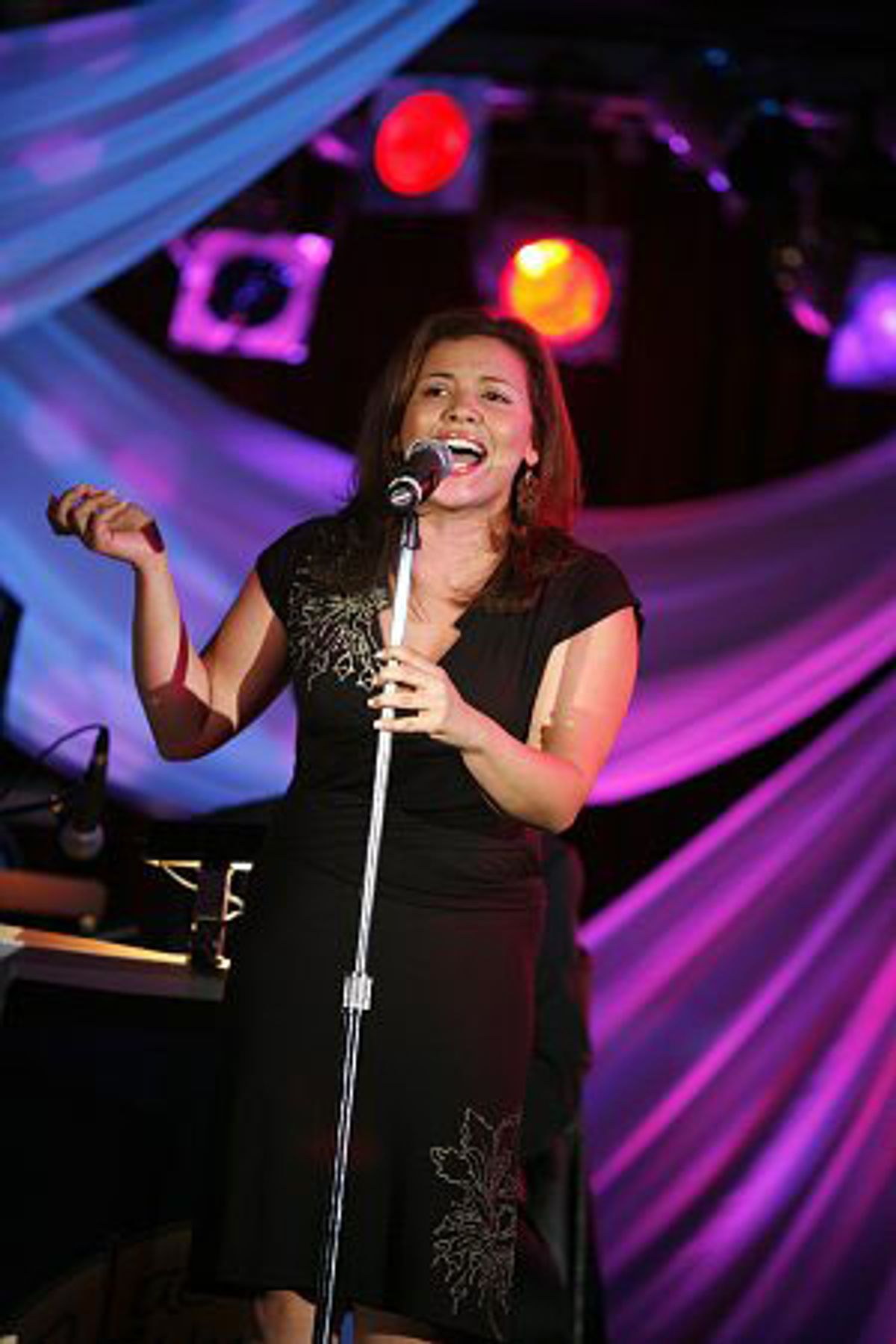 Justina Machado
 at 