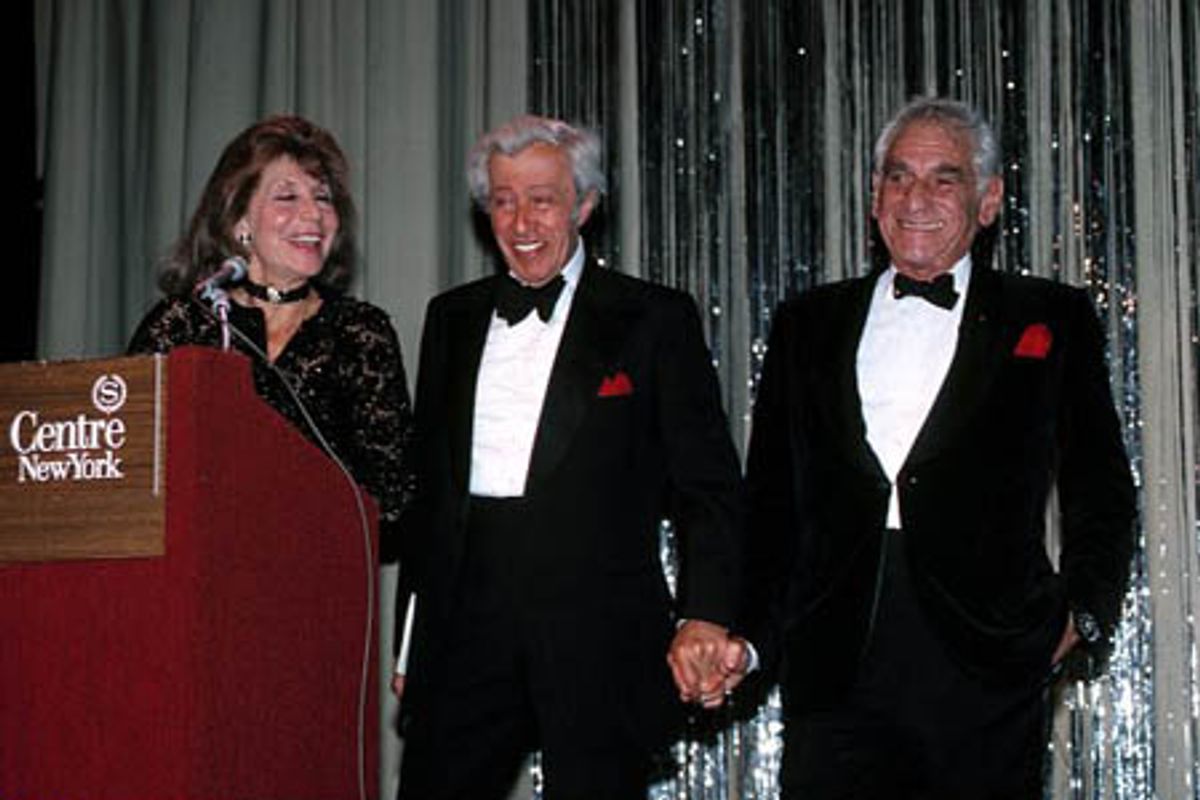 Betty Comden, Adolph Green and Leonard Bernstein attending a gala at the Sheraton Center Hotel in New York City, October of 1983 at 