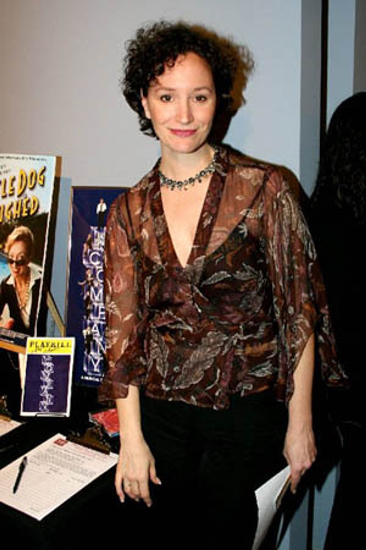 Barbara Walsh with the Company items for silent auction at 