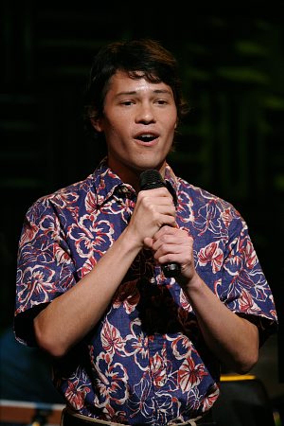 Jason Tam brought a touch of his native Hawaii to the crowd
with a Hawaiian Christmas song at 