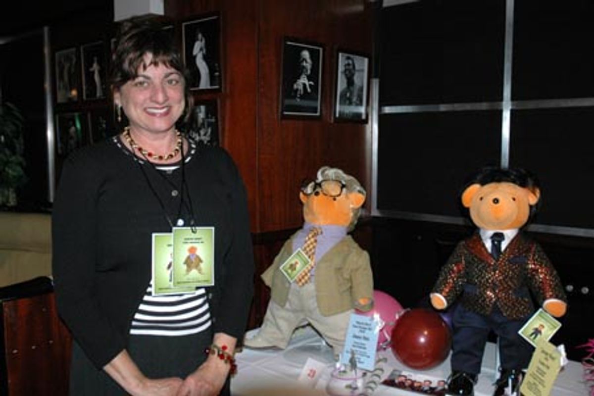 Rosi Zingales with Frankie Valli, Jersey Boys Bear, 2006 -$4,250 and Jiminy Glick Bear, Martin Short: Fame Becomes Me, 2006 - $800 at Broadway Bears X Auction Preview