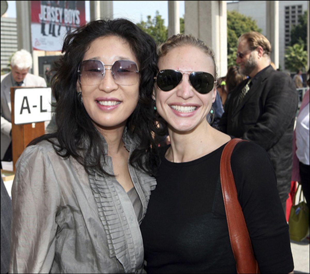 Sandra Oh and guest at 