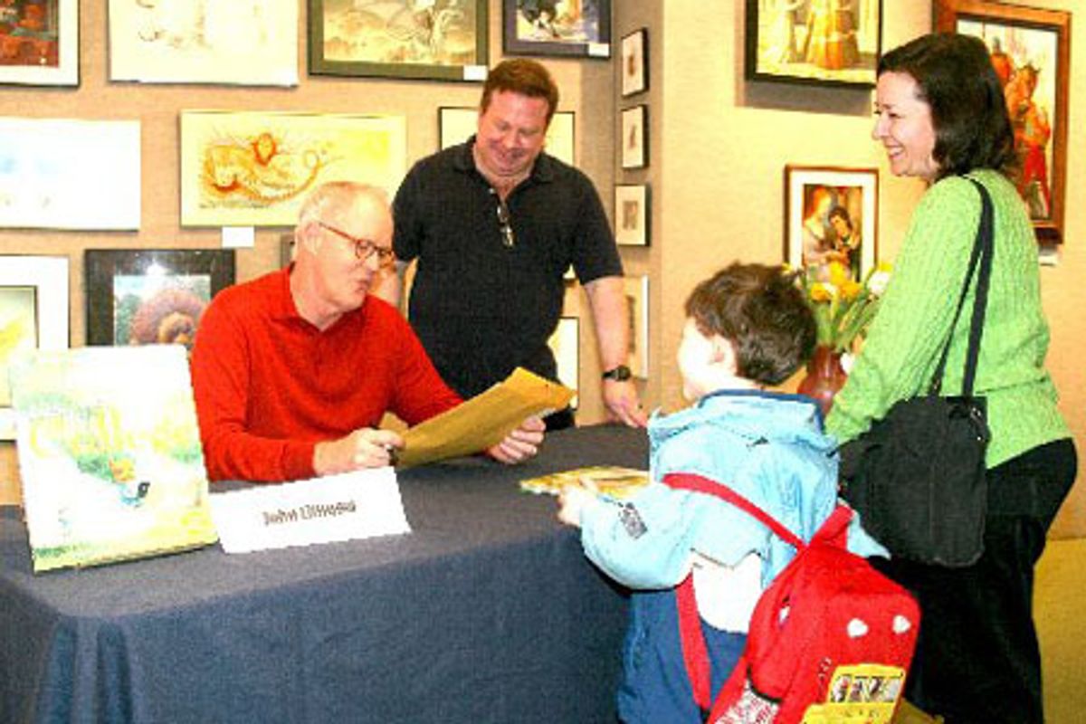 John Lithgow reads a poem written by young fan Jason Applebaum while Peter Glassman and Jason's mom Judy Kameny Applebaum look on at 