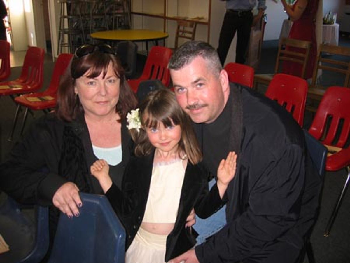 Liz Bertsch and husband Jerry Raustiala with daughter Bridie at Hayground Orchestra Concert