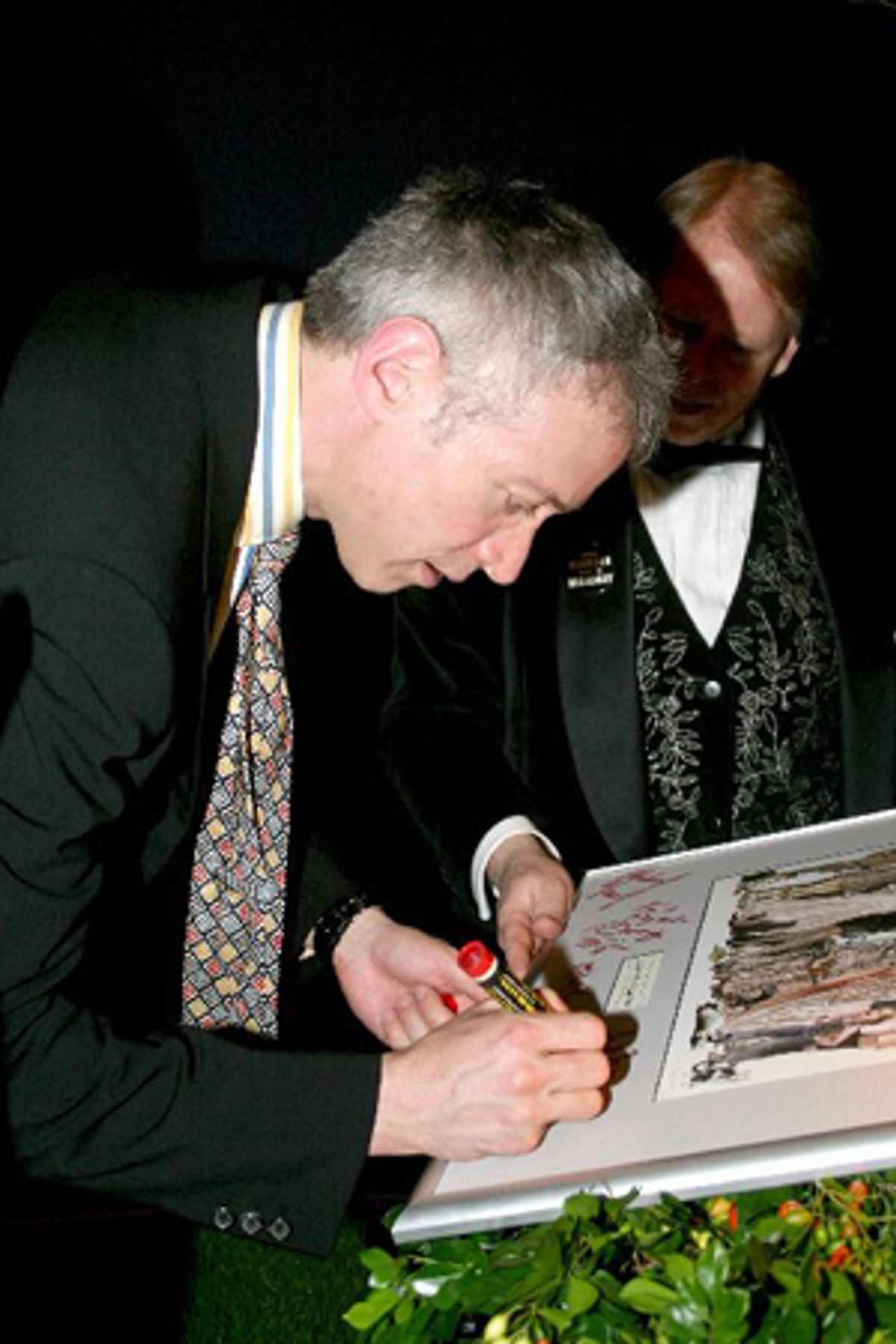 Scott Frankel signs the Grey Gardens painting at 