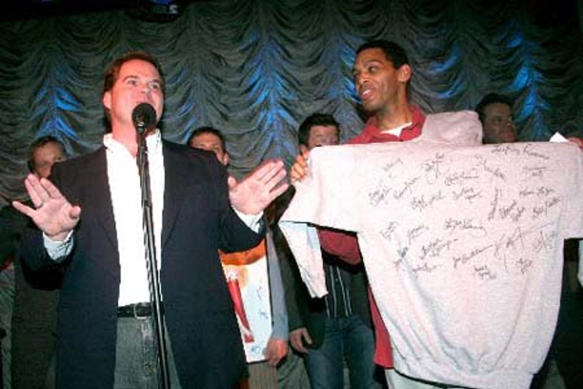 John Treacy Egan and Robert Fowler auction an autographed cast hoodie at 