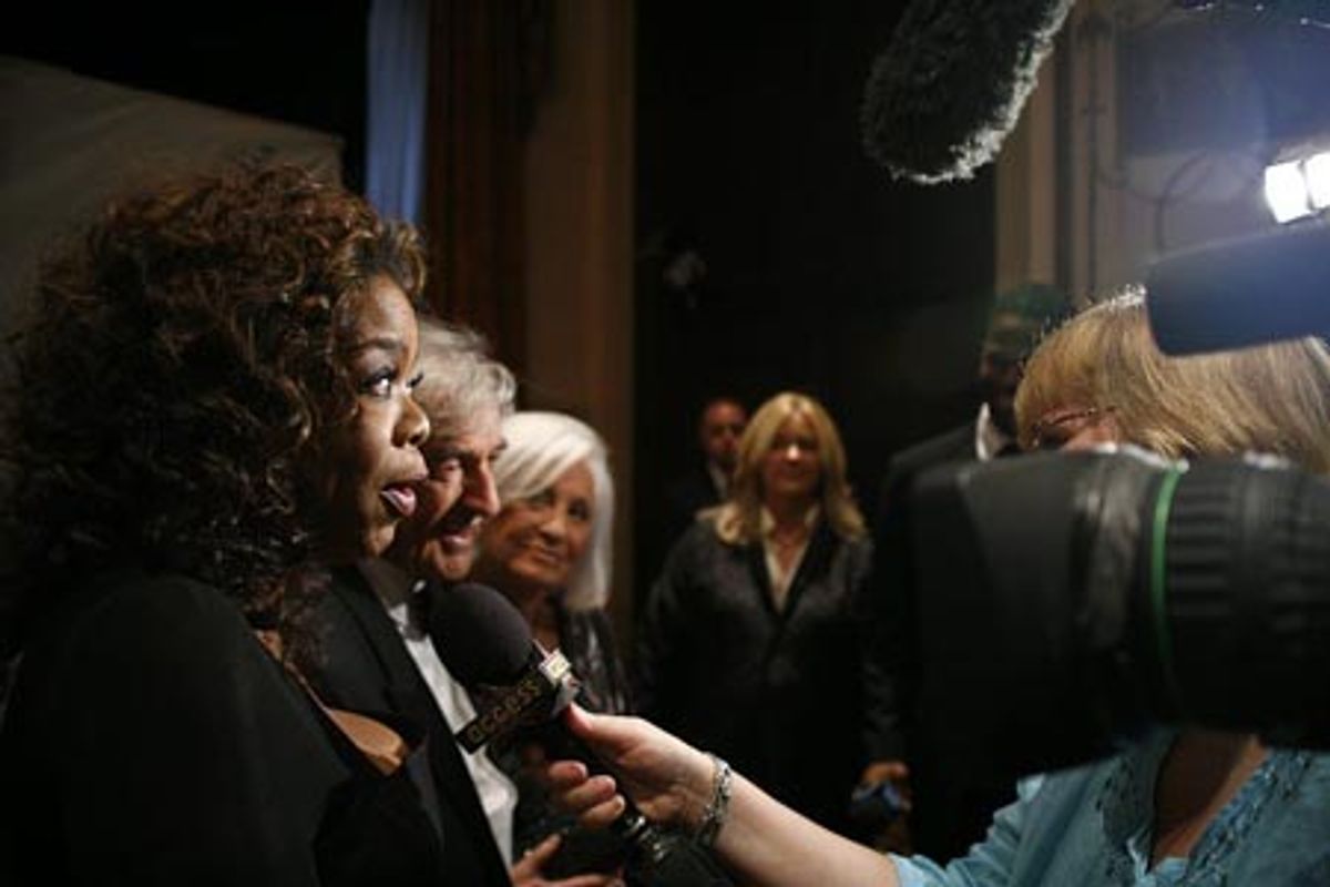 Oprah Winfrey and Elie Wiesel are interviewed at 