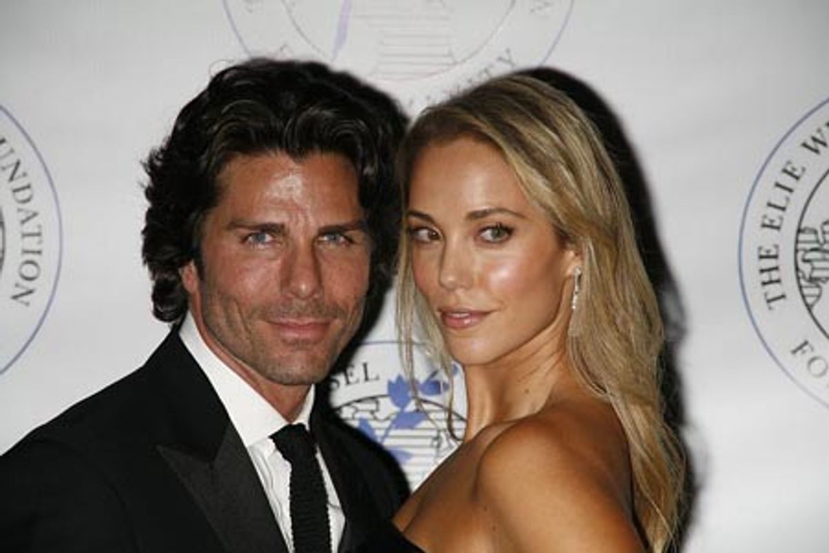 Greg Lauren and Elizabeth Berkley at 