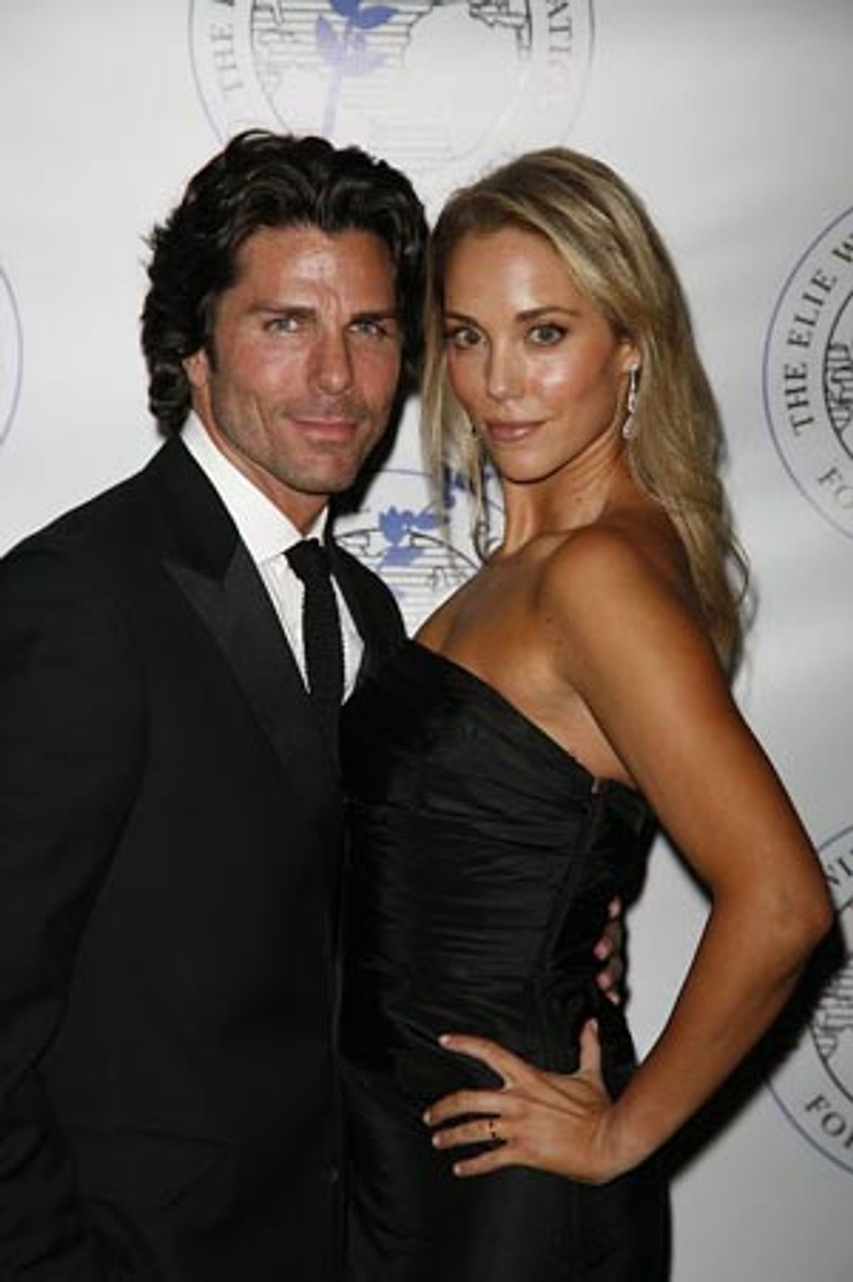 Greg Lauren and Elizabeth Berkley at 