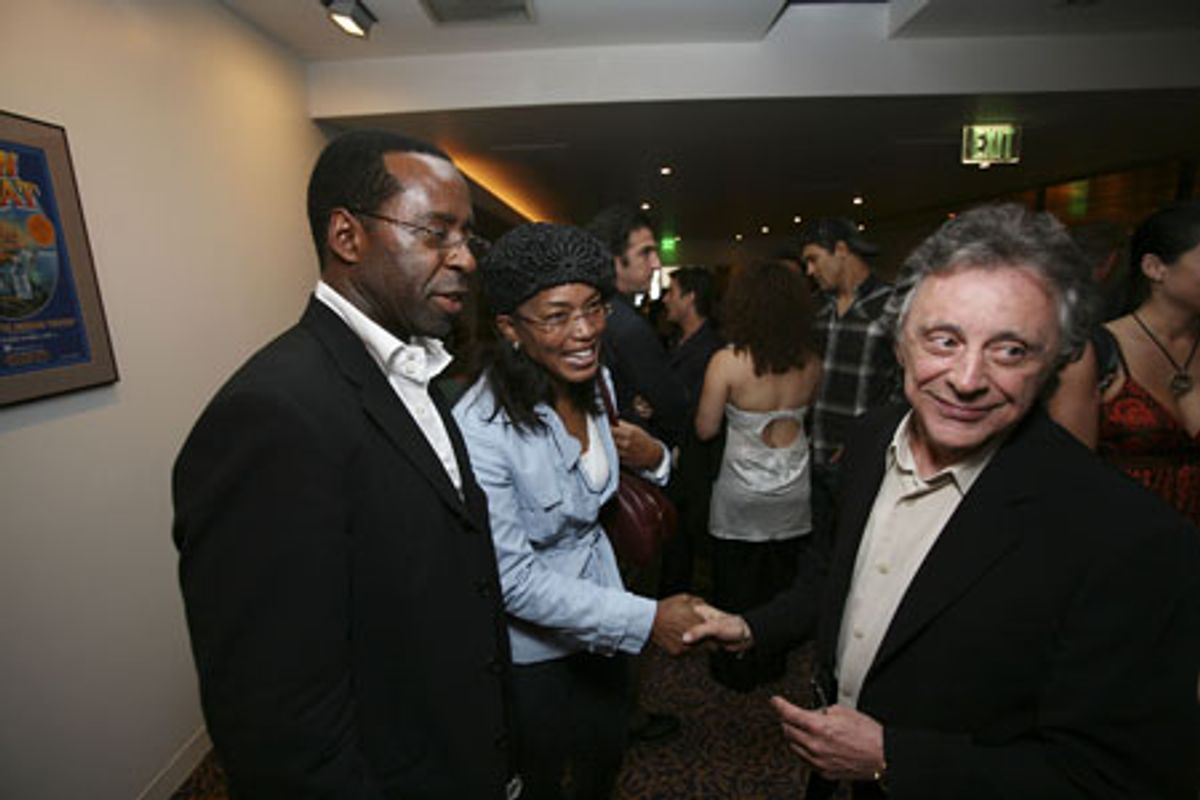 Courtney B. Vance with wife Angela Bassett greet Frankie Valli at 