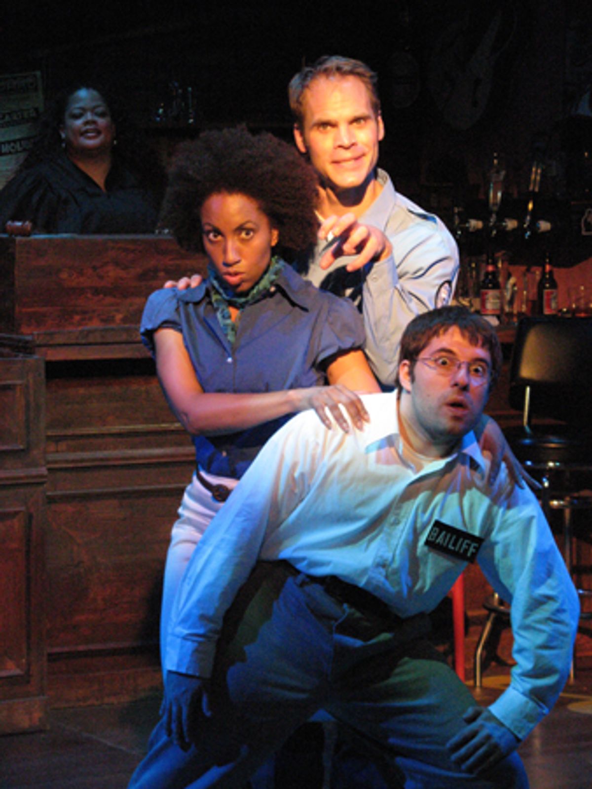 (Top to bottom) David Jon Wilson as Officer Bell, Marcie Henderson as Tish Thomas, and Omri Schein as Bailiff at 
