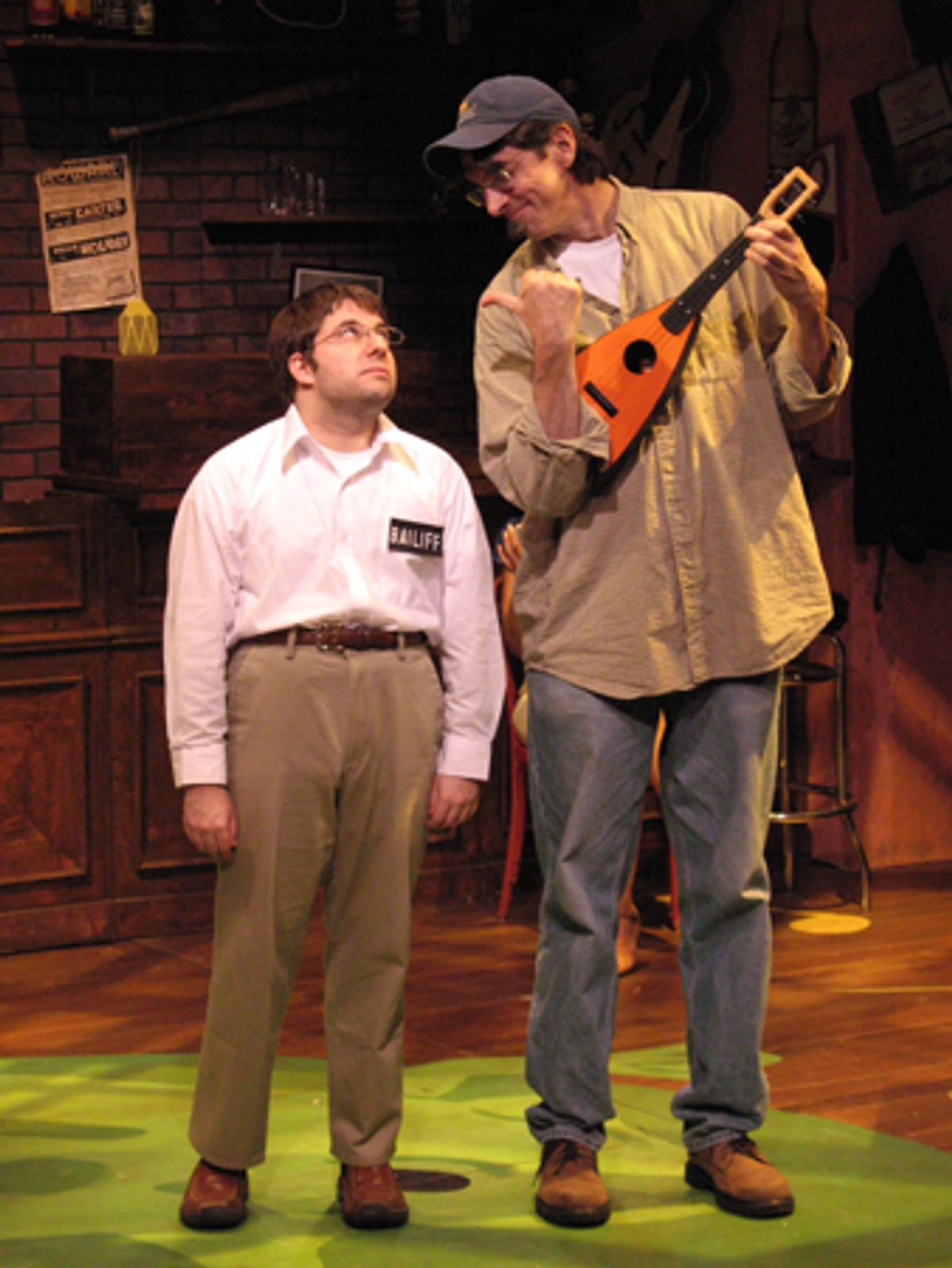 Omri Schein as Bailiff and Ritt Henn as Clerk at 