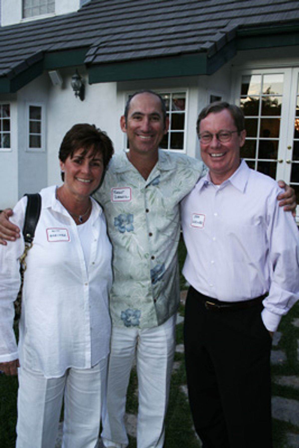Theatre Project Founder Robert Schwartz flanked by Kim and Jeff Greiner at 