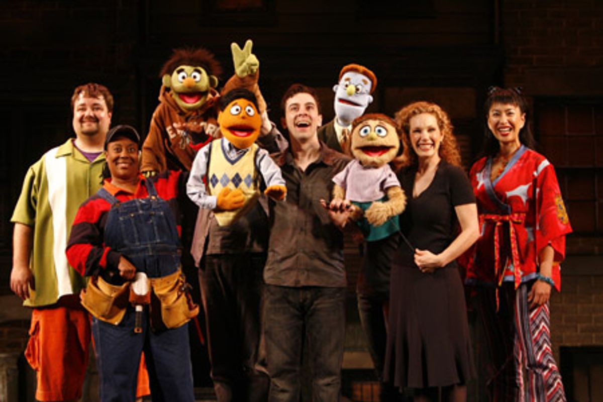 The company of Avenue Q (l-r): Cole Porter, Carla Renata, Nicky, Princeton, Robert McClure, Rod, Kate Monster, Kelli Sawyer and Angela Ai at 