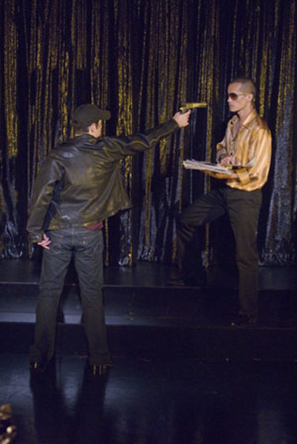 Danny (Daniel Torres) becomes the ultimate celebrity when he shoots fashion designer Apolo Sera (Arthur Acuna) at 