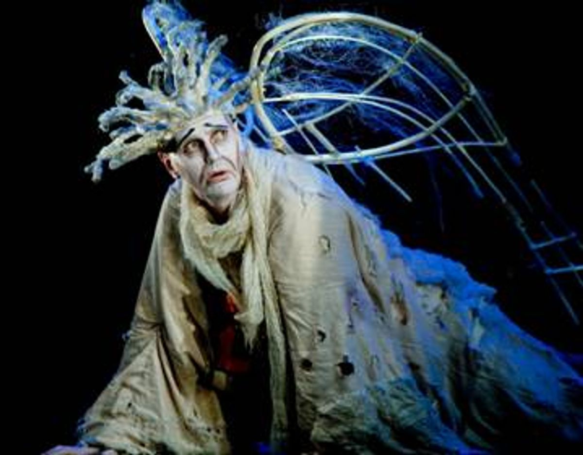 A VERY OLD MAN WITH ENORMOUS WINGS at 