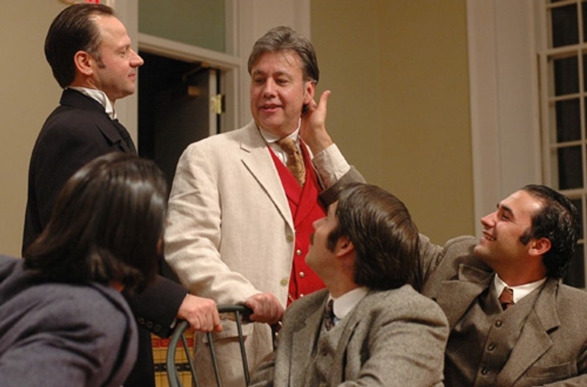 Oscar Wilde (center standing, JM Richardson) enjoys the adoration of his followers, played by cast members (l-r) Dillon Medina, Michael Zola, Tom Bentley, and Patrick Poole. at 