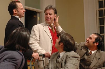 Oscar Wilde (center standing, JM Richardson) enjoys the adoration of his followers, p Photo