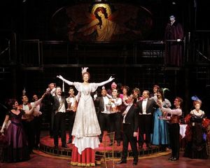 Kate Rockwell (center, as Christine Daee) and cast of Phantom perform "The Bistro" Photo