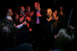 The cast welcomes director D.H. Johnson onstage Photo